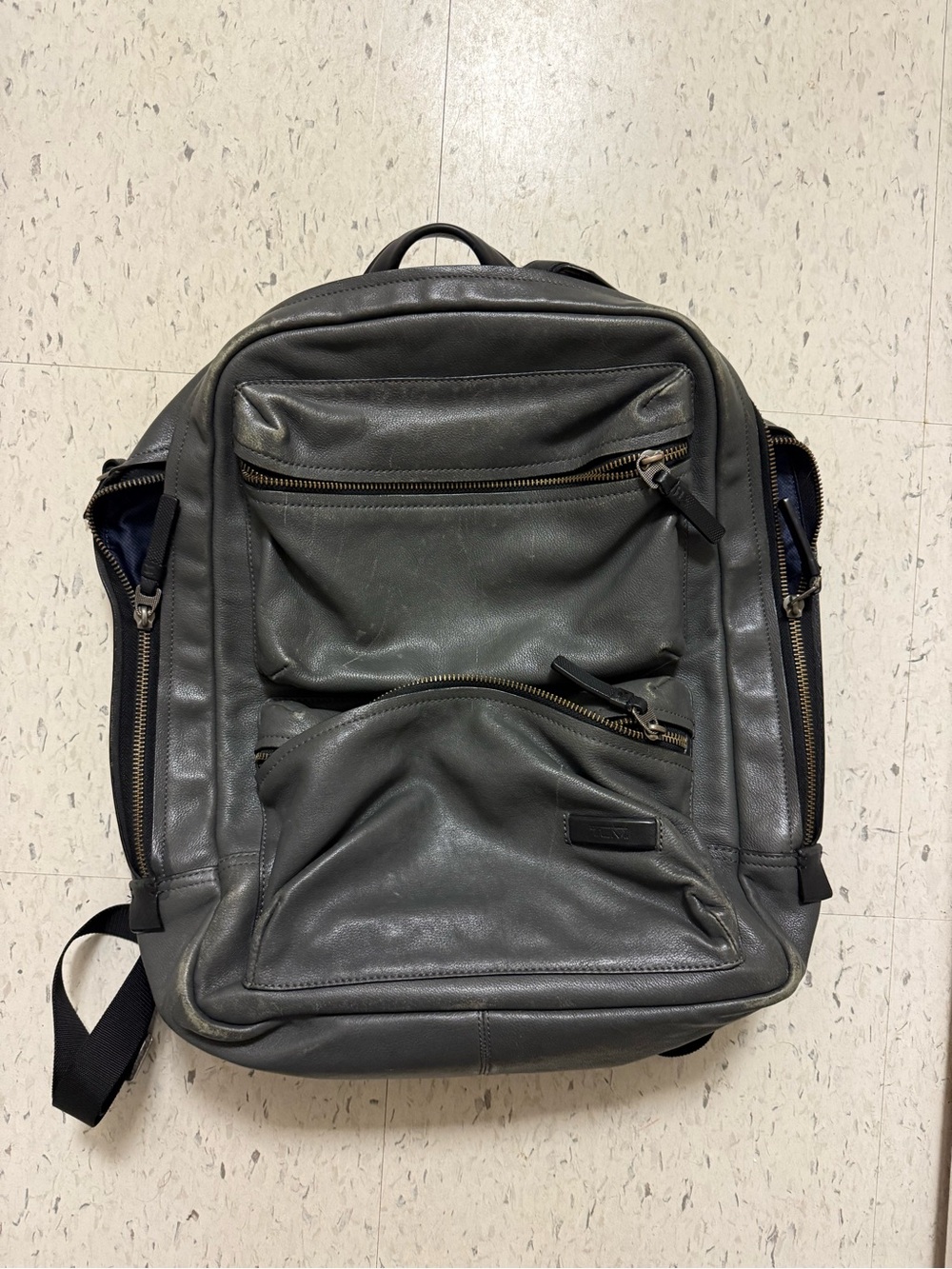 Tumi leather backpack